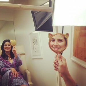 Meow. In the chair with Kristie and the  cutest kitty cat mirror that you ever did see.