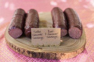 Turkey Summer Sausage and Beef Summer Sausage, served on a slab of wood for added harvest -festive feel.
